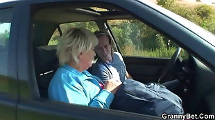 Elderly  getting romped in the car